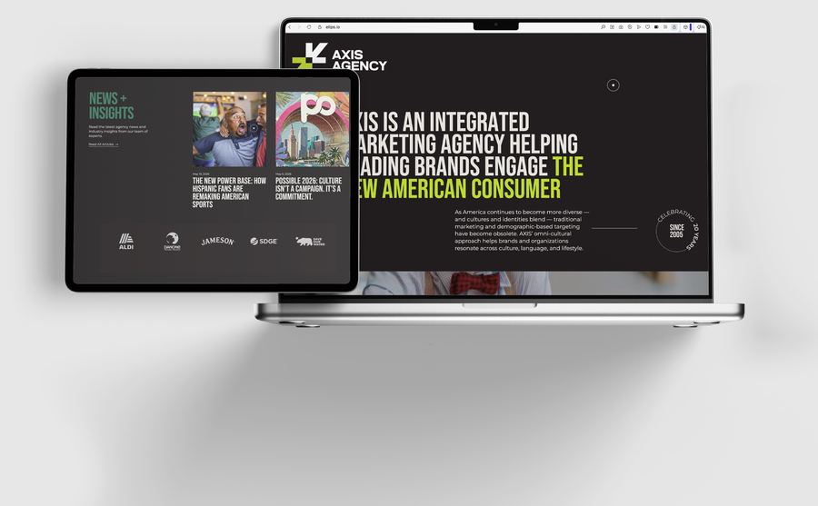 The Axis Agency website on laptop and tablet